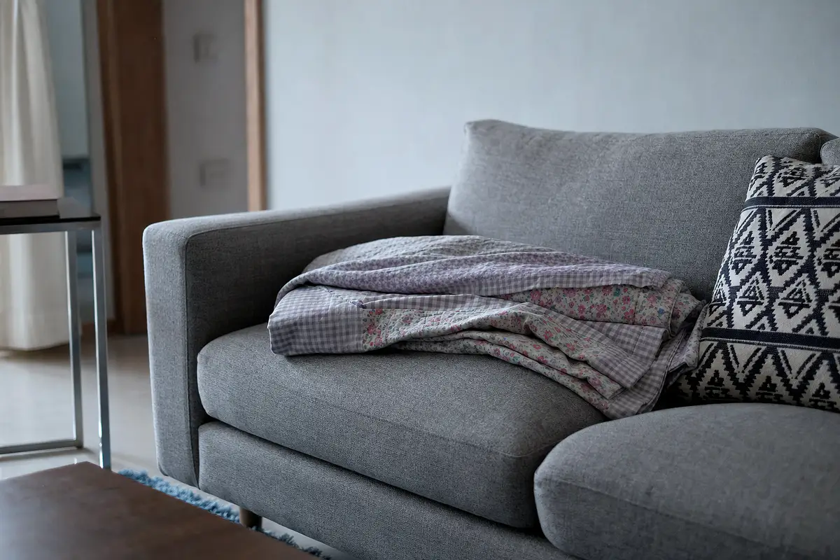 A quiet living room where a family might sit after a brief spell.